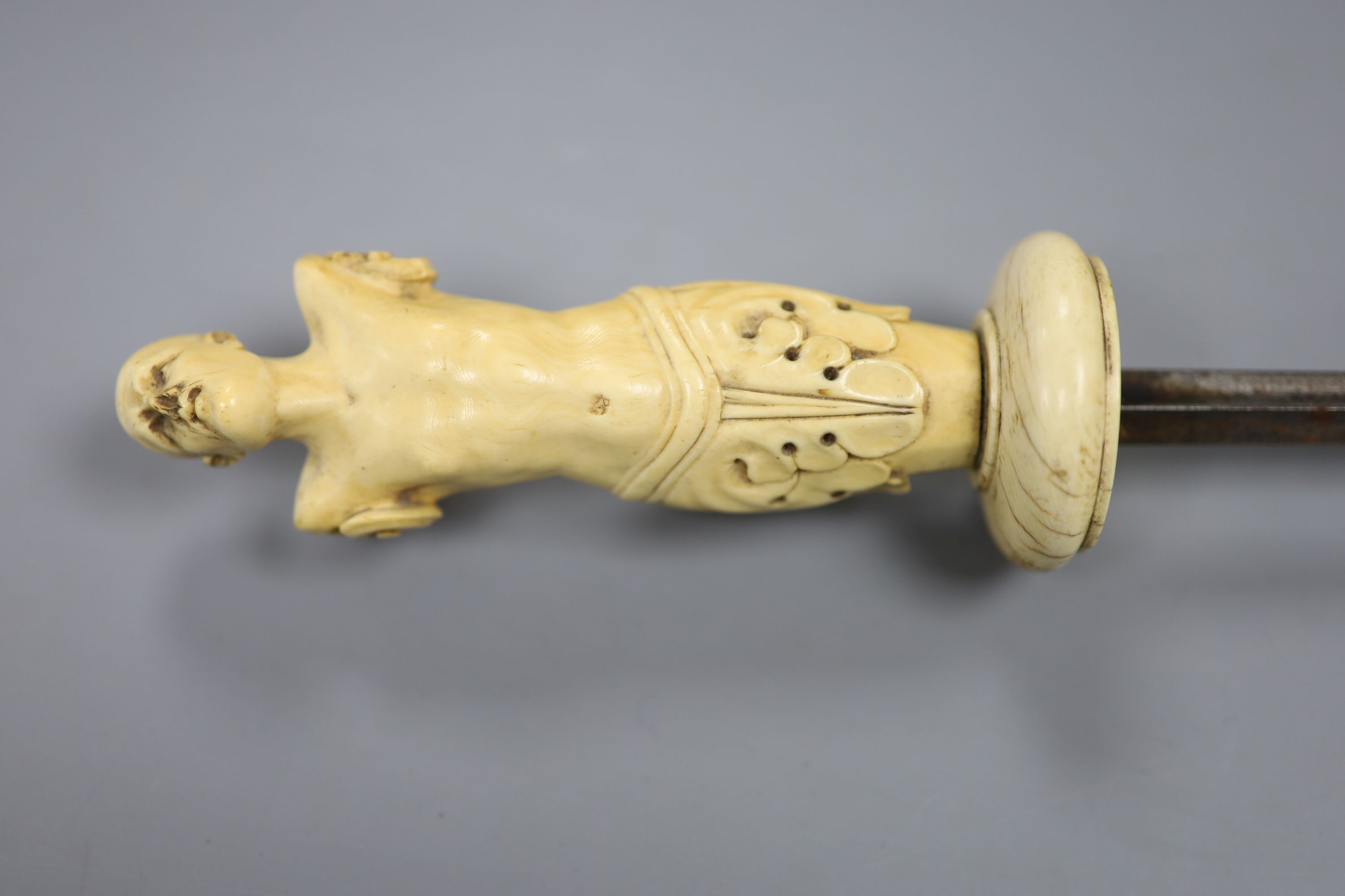 An 18th century German or Italian ivory hilt and guard. Length 41cm.